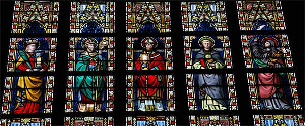 stained glass showing catholic saints