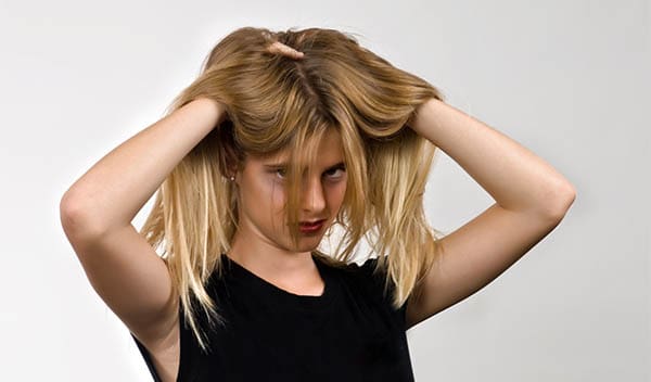 woman playing with her hair